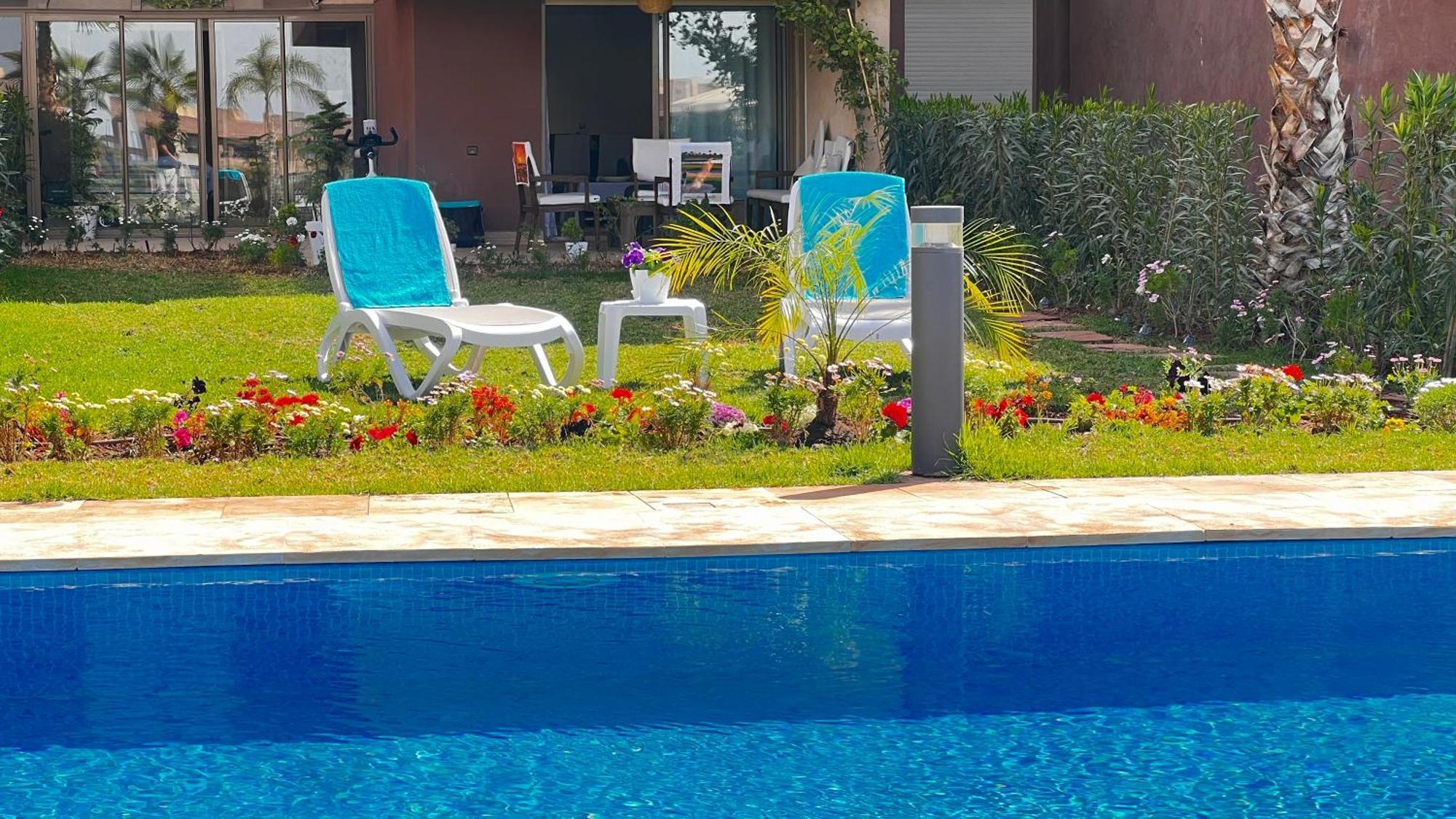 Appartement De Luxe Avec Jardin Vue Sur La Piscine Golf Securise 24H Sur 24 A 5 Minutes De L Aeroport มาร์ราเกช ภายนอก รูปภาพ